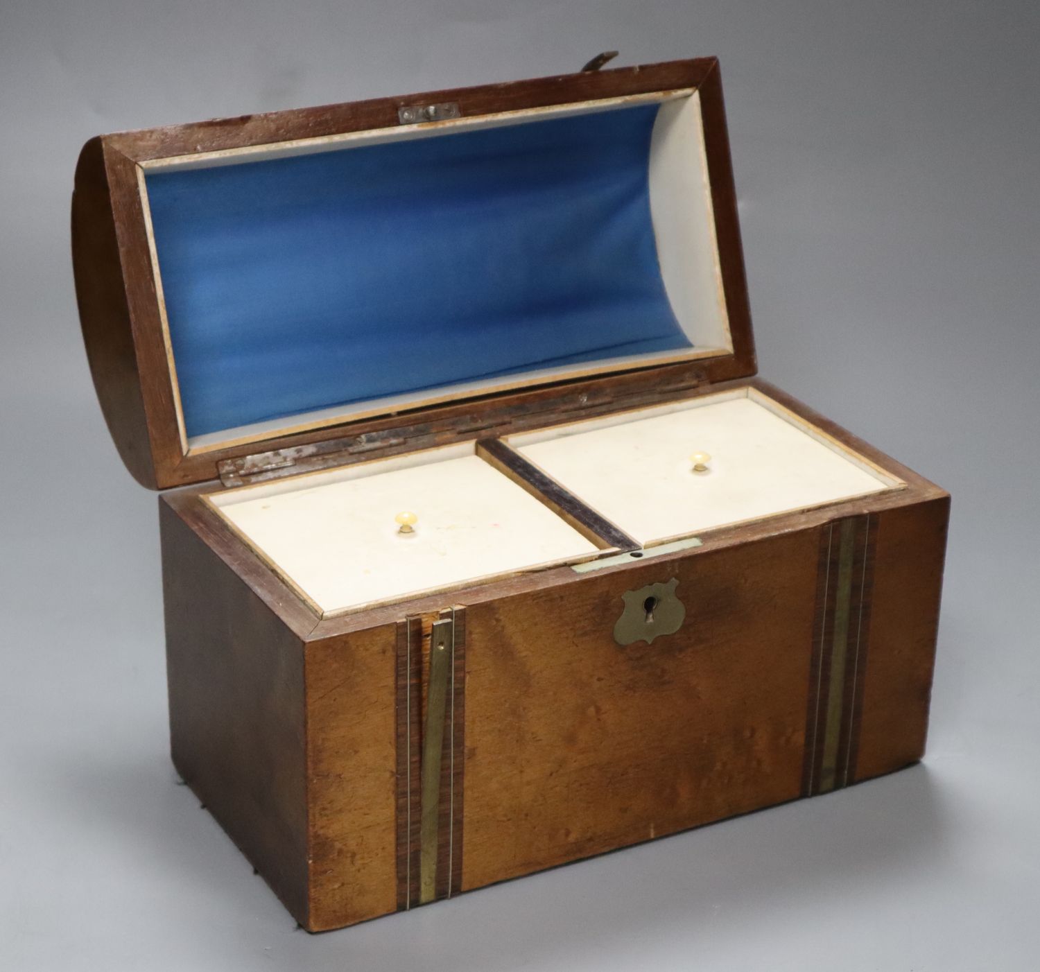 A Victorian domed topped inlaid and crossbanded walnut tea caddy, 23cm
